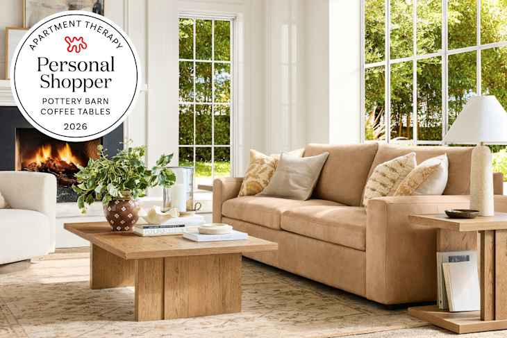 living room with Pottery Barn furniture featuring a coffee table