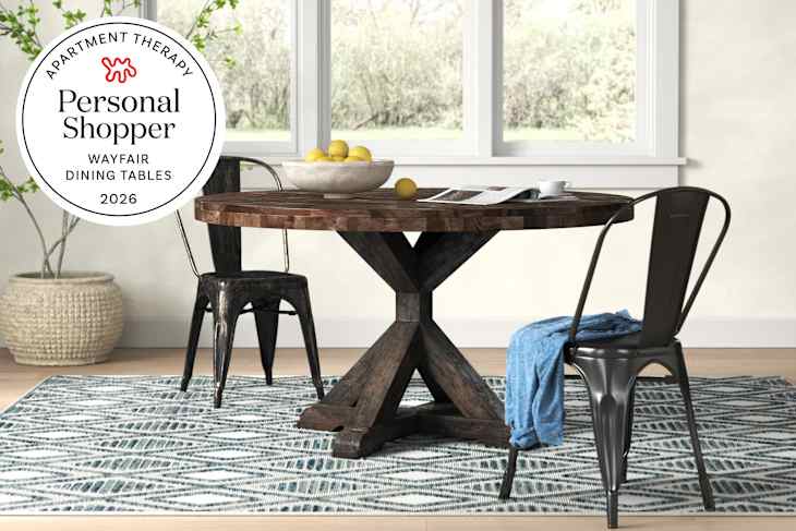 Wayfair dining table in room with seal in upper left that reads "Apartment Therapy Personal Shopper: Wayfair Dining Tables 2026"
