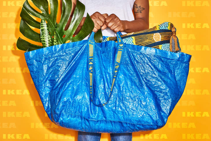 Blue shower bucket outdoors Stock Photo