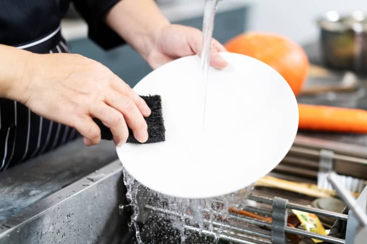 Chef washing dish