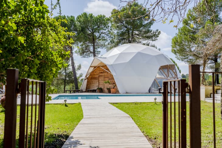 Exterior of dome shaped room by swimming pool at hotel
