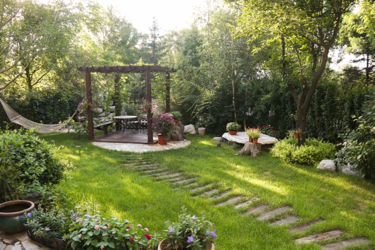 House backyard with hammock and pergola