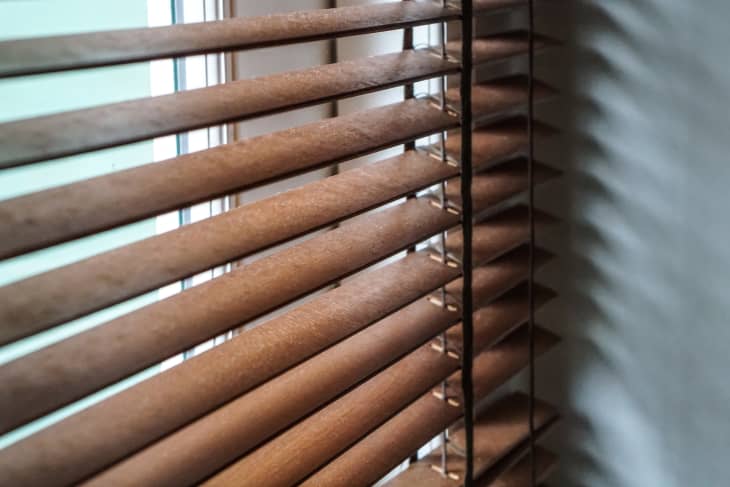wood blind shade curtain and shadow