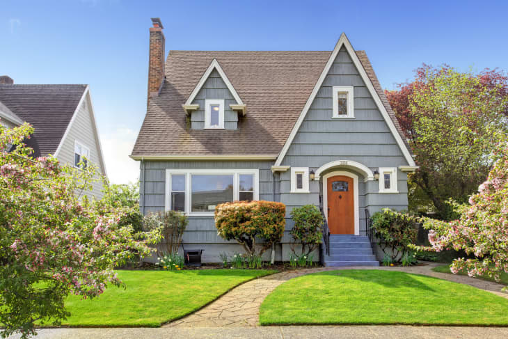 House exterior. View of landscape on front yard