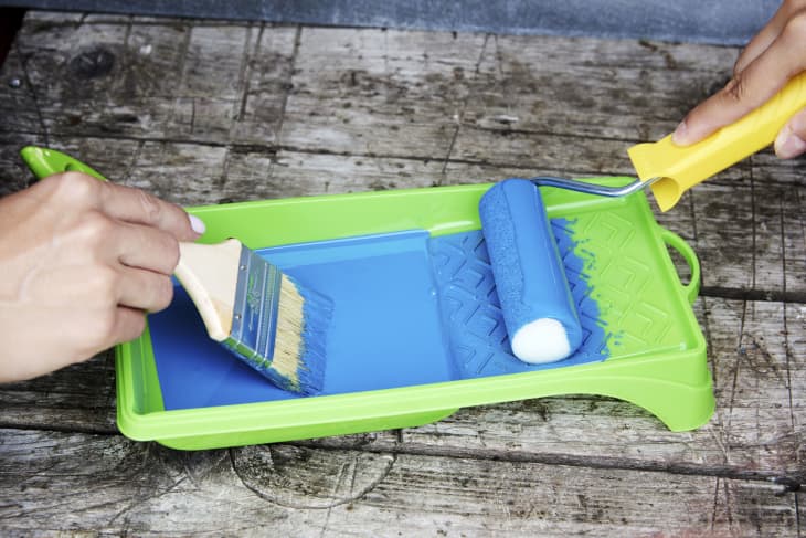 Paint tray is used by house painters with roller and brush.