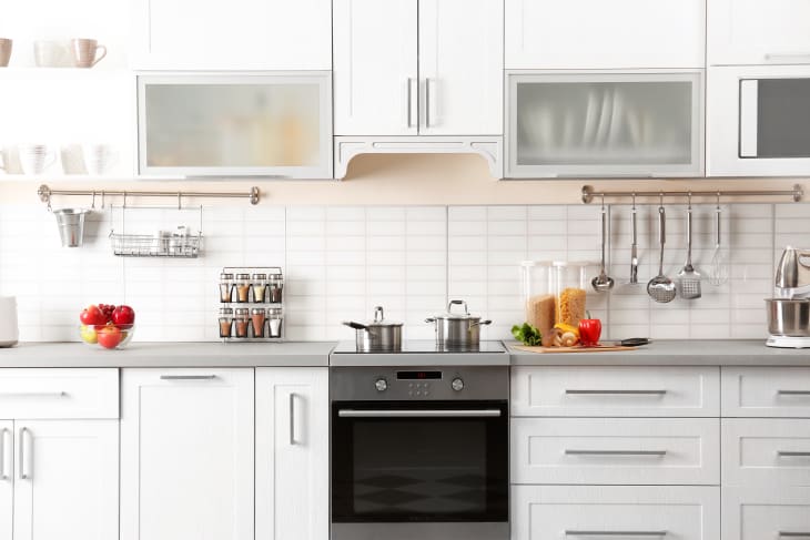 Modern Appliances In New Kitchen Apartment Stock Photo