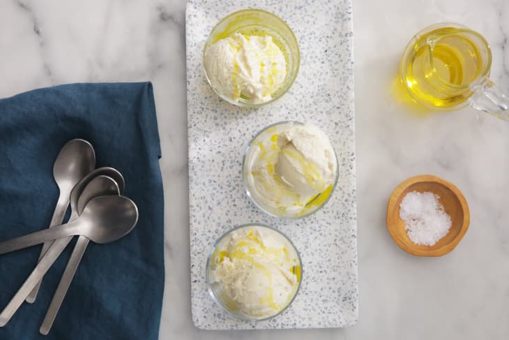 bowls of vanilla ice cream, topped with olive oil and salt