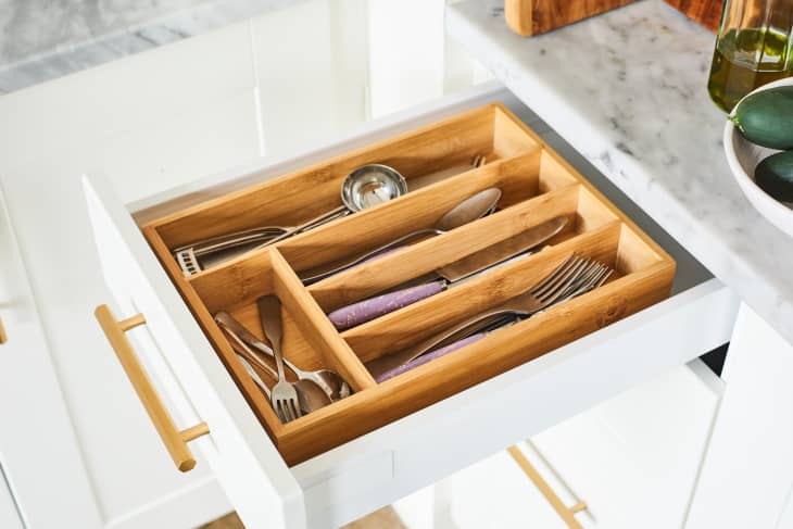 Wooden utensil organizer inside drawer