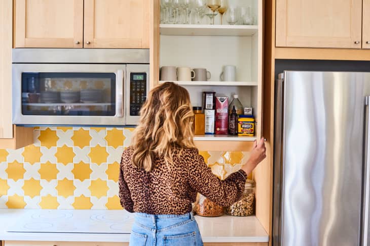 This Lid Organizer Instantly Made My Cabinets Looks Less Cluttered, and  It's Only $13 Right Now