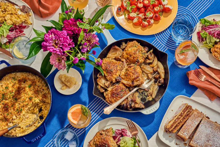 ultimate dinner party meals on a table with blue linnen