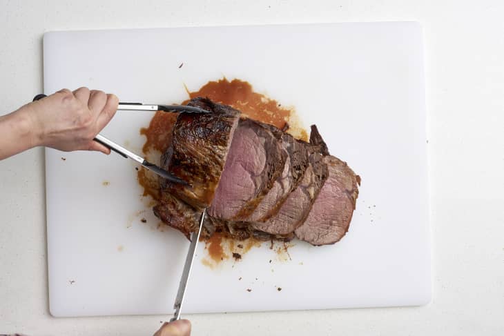 The juiciness of prime rib is only enhanced by a long rest after roasting. For me, this is the ideal opportunity to greet visitors and serve them a cocktail so that you may bring the entire roast to the table for carving.