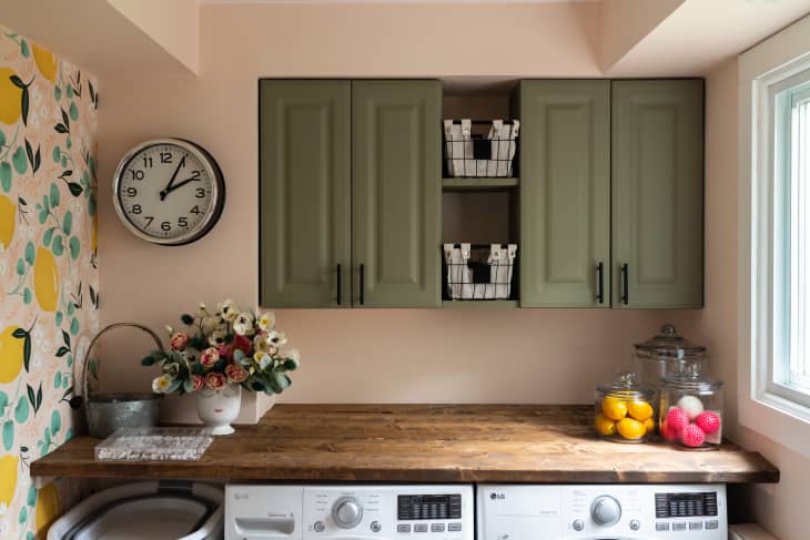 Use This Genius Clothes Hanger Hack To Paint Your Kitchen Cabinets With Ease