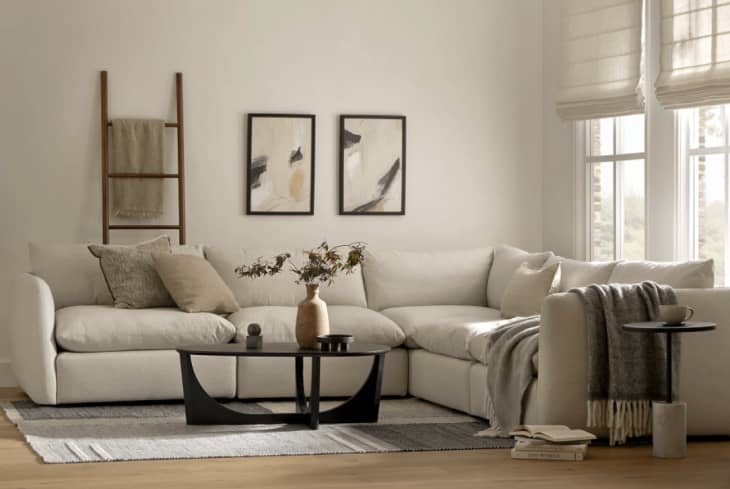 neutral living room with big light gray sectional
