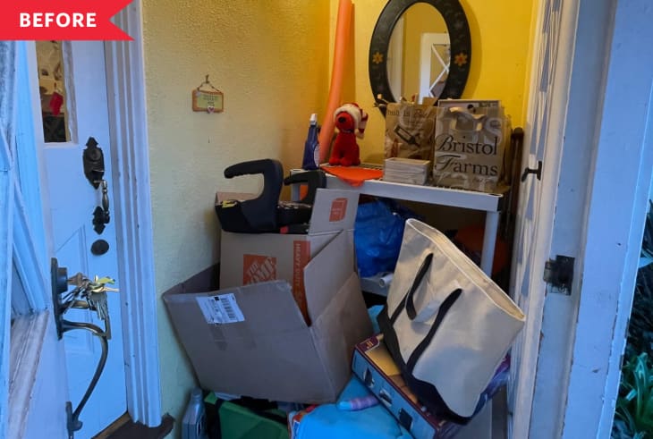 Before: Cluttered entryway at front door