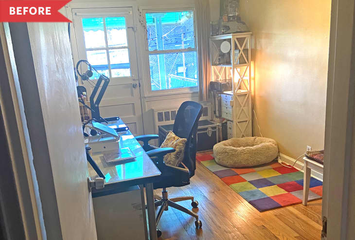 Before: Office with desk on left wall and colorful square rug