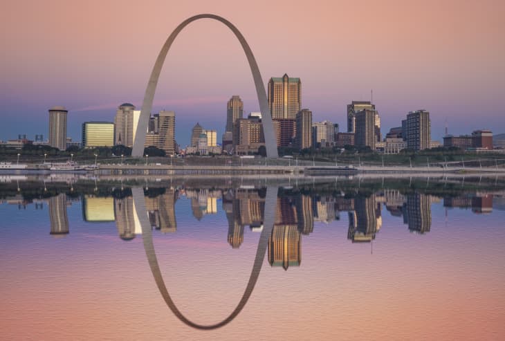 Sunrise reflection of the St Louis skyline along the Mississippi River