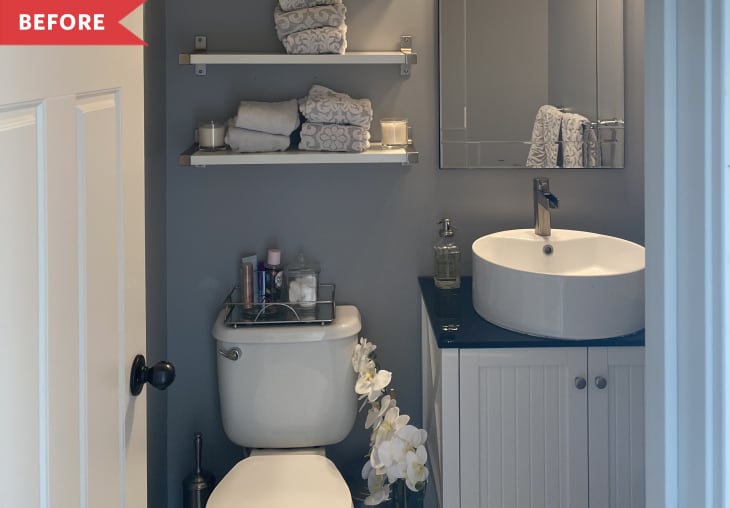 Before: Gray builder-grade bathroom