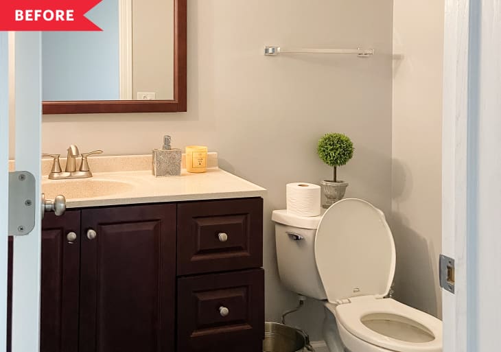 Before: Bathroom with dark wood vanity and white walls