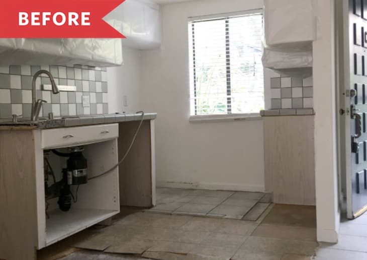 kitchen before renovation missing cabinet doors peeling floors
