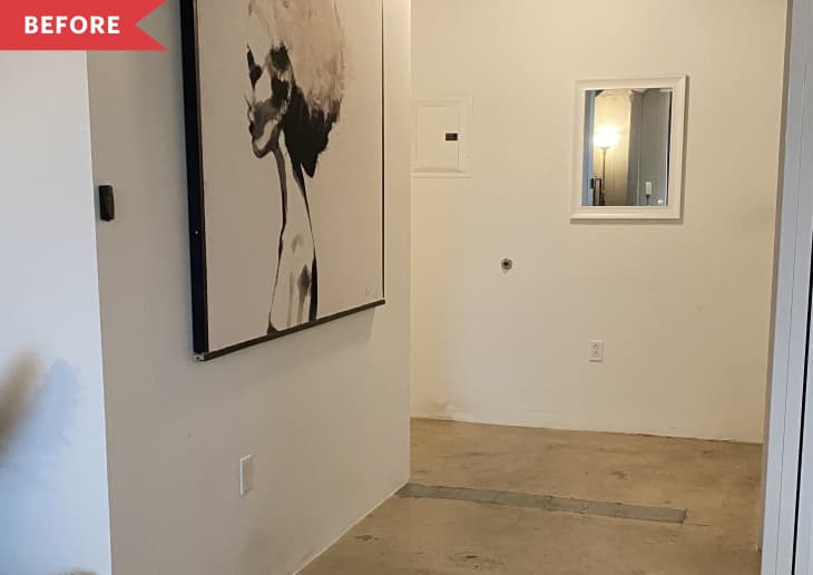 Before: Plain white entryway with one piece of art (portrait of a woman)