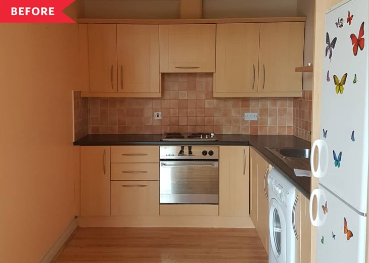 Before: orangey wood kitchen with black counters and orange tile backsplash
