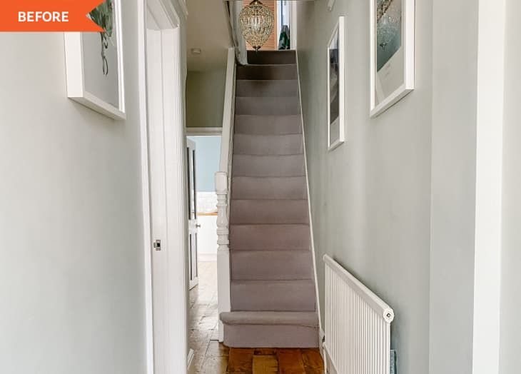 Before: Gray carpeted staircase in entryway