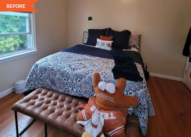 Bedroom with paisley-patterned bedding, brown tufted bench, and a plush toy wearing a Texas jersey.