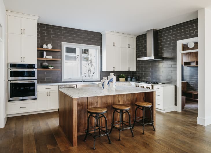 Modern kitchen with the hardwood floors.