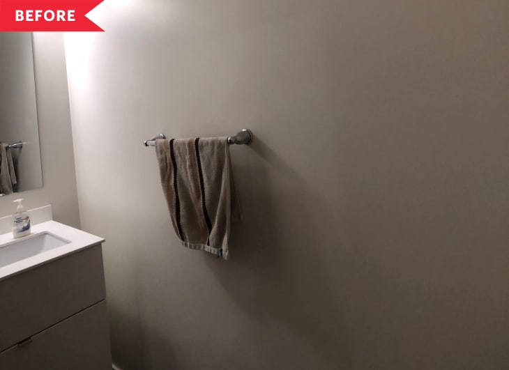 Before: Plain powder room with white walls