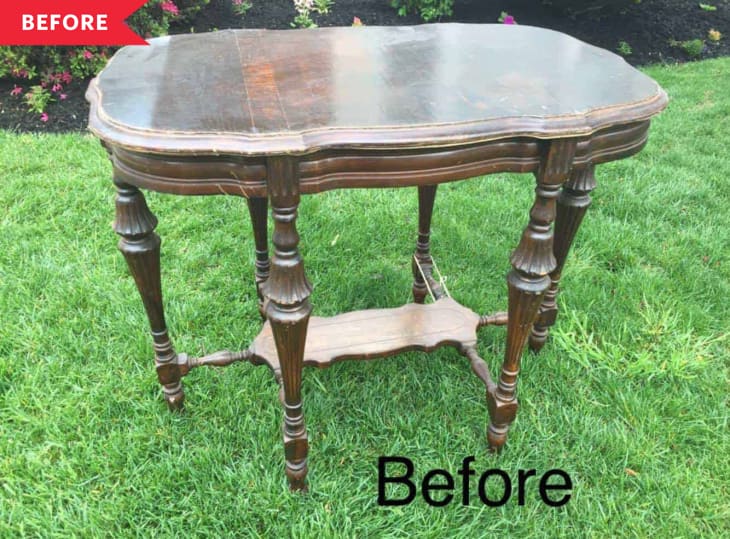 Ornate wooden table with curved edges and turned legs on grass, labeled "Before."