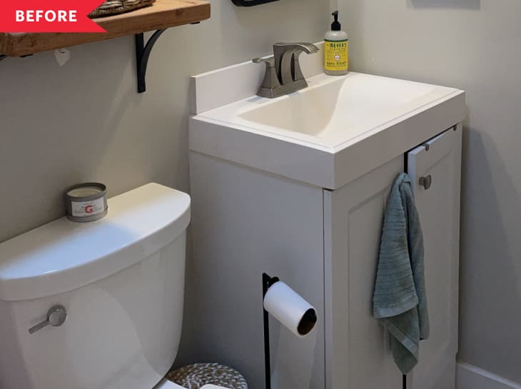 Before: Bathroom with beige walls and white vanity