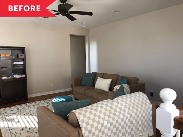 Living room with beige sofas, teal and white pillows, checkered throw, dark bookshelf, and ceiling fan.