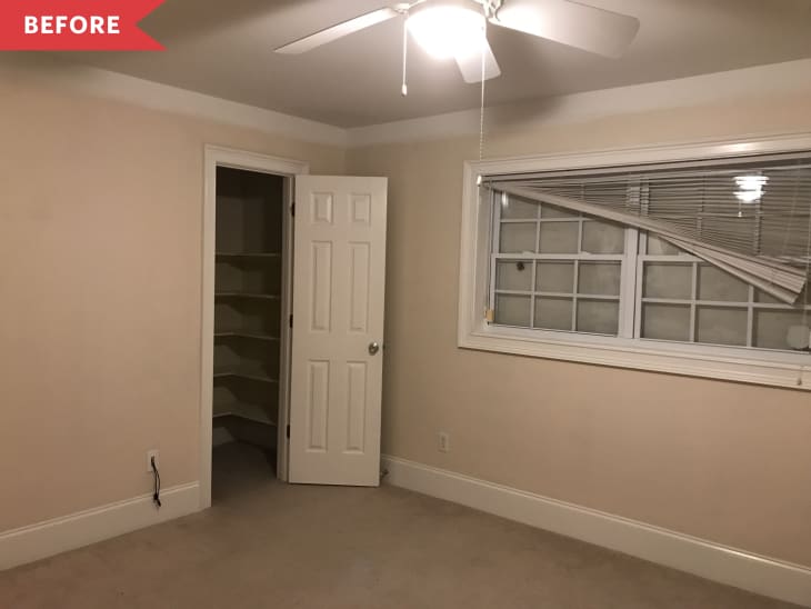 Empty beige room with a ceiling fan, open closet door, and window with bent blinds.