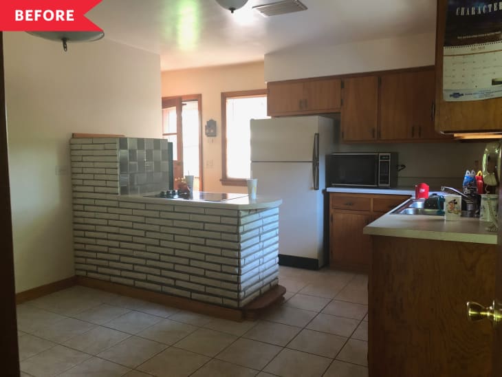 Before: 1950s Kitchen with wood cabinets and beige walls