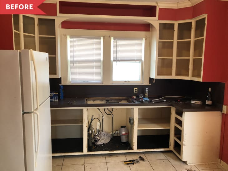 Before: Outdated kitchen with red walls