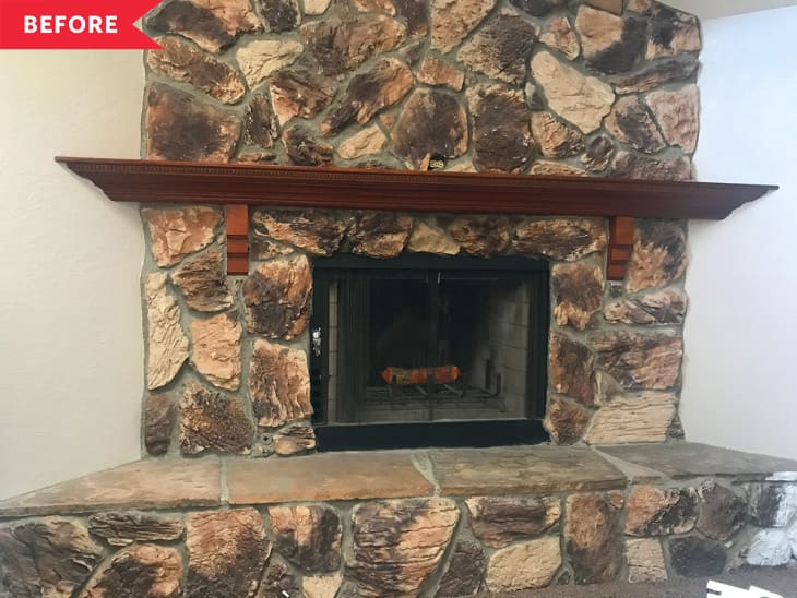 Before: Dated fireplace with dark mismatched stone