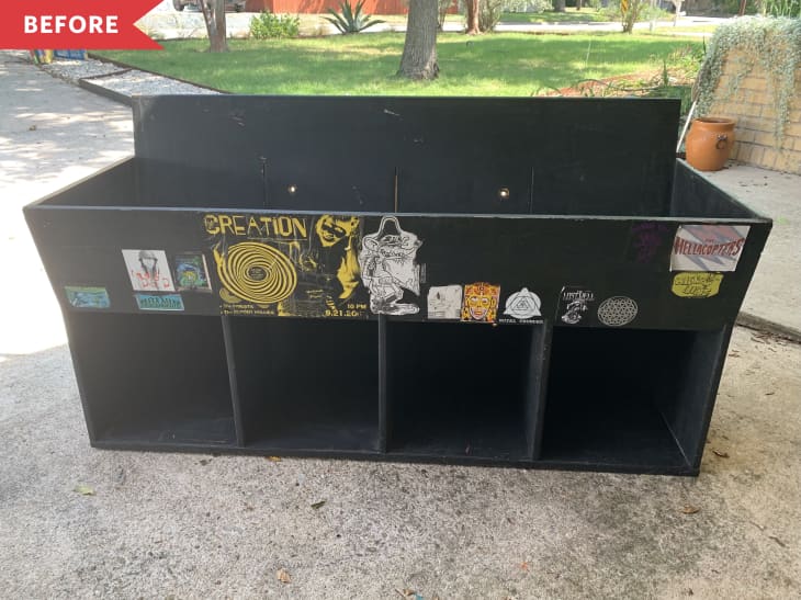 Before: record cabinet painted black and covered with stickers