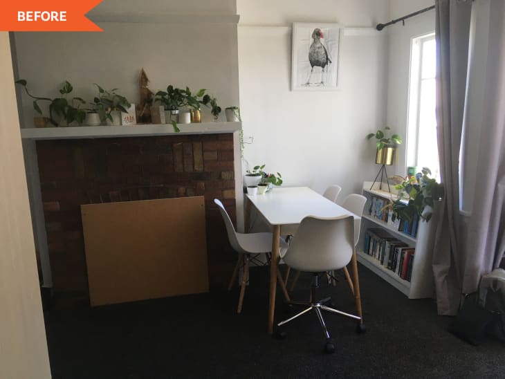 Before: dining room with table and fireplace