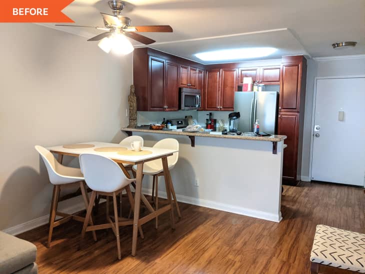 Before: a kitchen with wooden cabinets and a small rectangular dining table