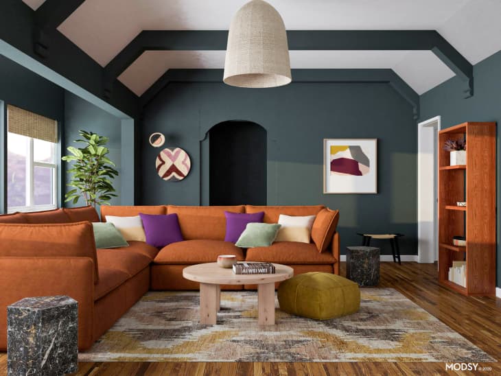 Living room with gray-green walls and brown-orange sectional