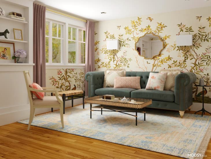 Bright living room with large window and floral wallpaper