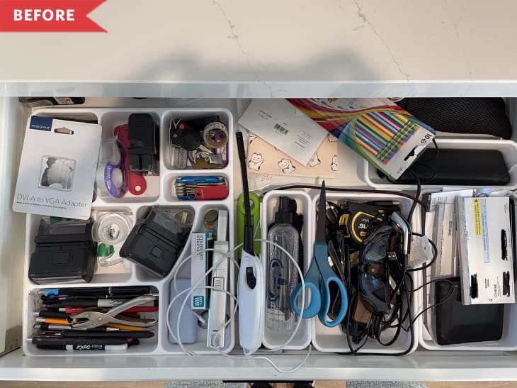Before: Cluttered drawer with chargers, keys, and office supplies