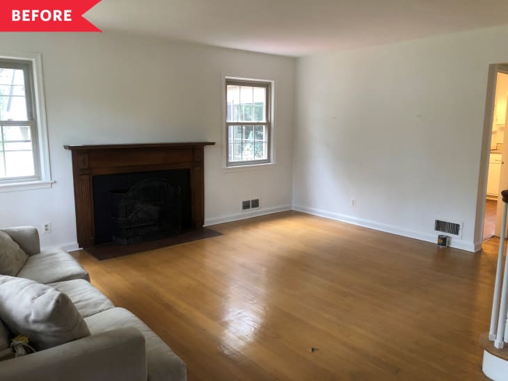 Before: Sparse living room with fireplace and khaki-colored sofa