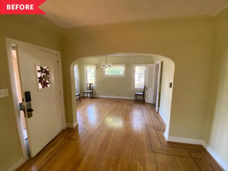 Before: Entryway and dining area with beige walls and white door