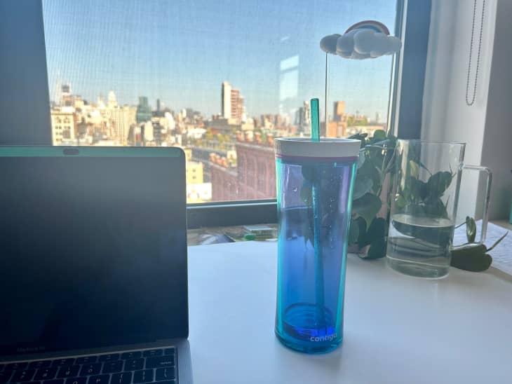 Contigo water bottle on work desk.