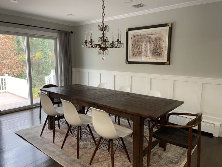 Taryn Mohrman's dining room featuring a brass and crystal chandelier