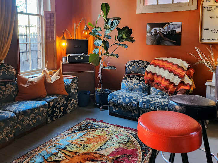 Colorful vintage furniture in guest bedroom.