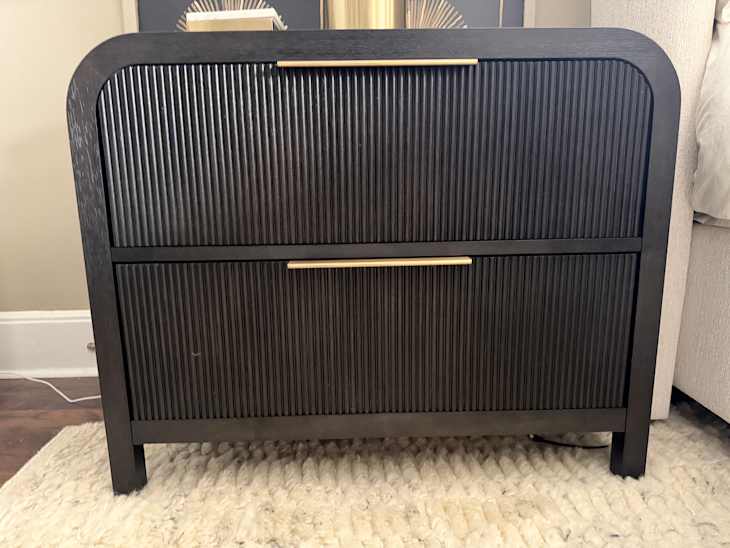 Arden dresser next to bed.