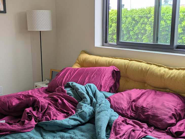 Bed before being made.