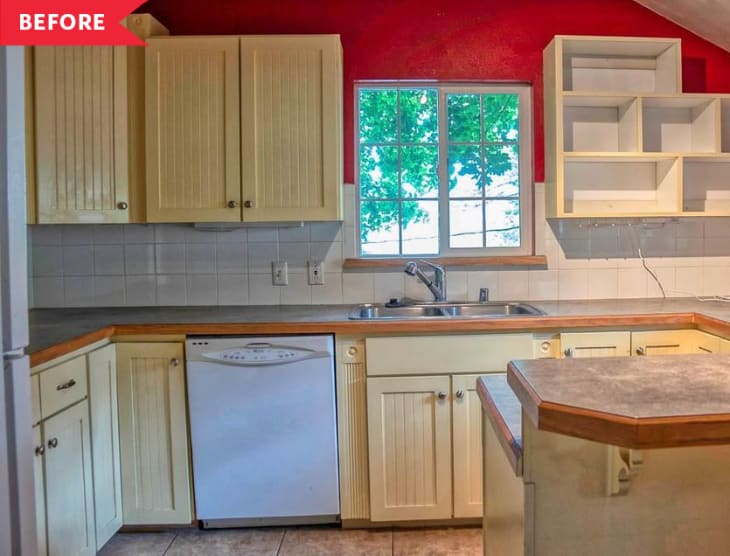Red kitchen walls with white shop cabinets